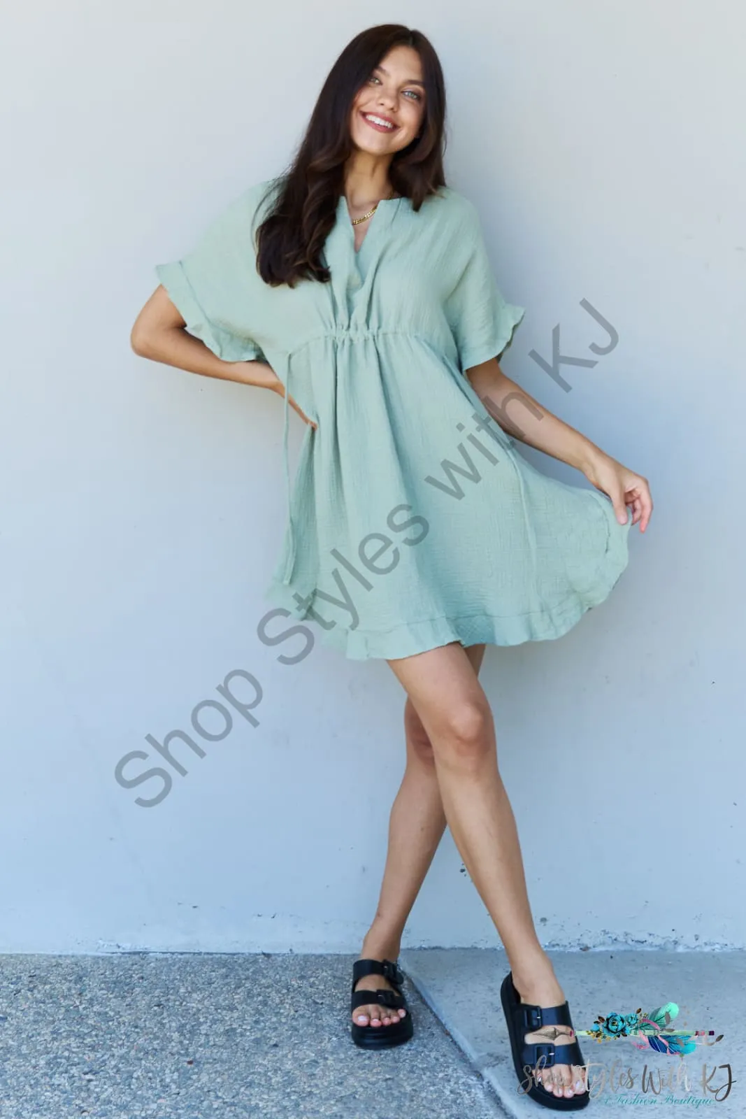 Out Of Time Ruffle Hem Dress with Drawstring Waistband in Light Sage