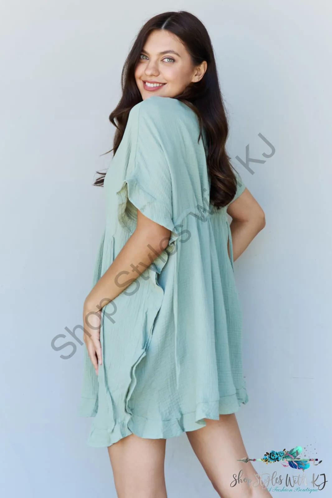 Out Of Time Ruffle Hem Dress with Drawstring Waistband in Light Sage