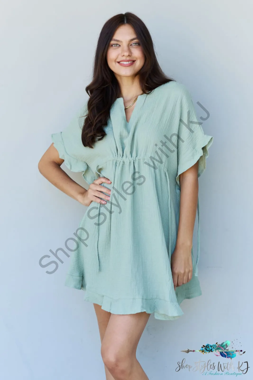 Out Of Time Ruffle Hem Dress with Drawstring Waistband in Light Sage